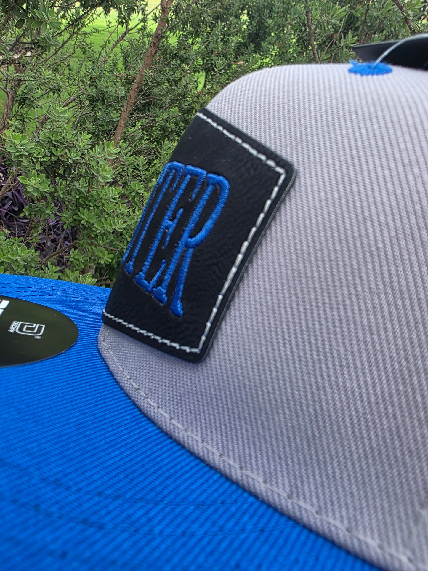 Youth Flatbill Hat with Embroidered Leather Patch